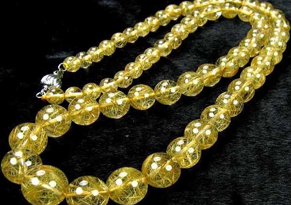 金发晶珠串珠子价格多少钱一克?发晶价格受哪些因素的影响